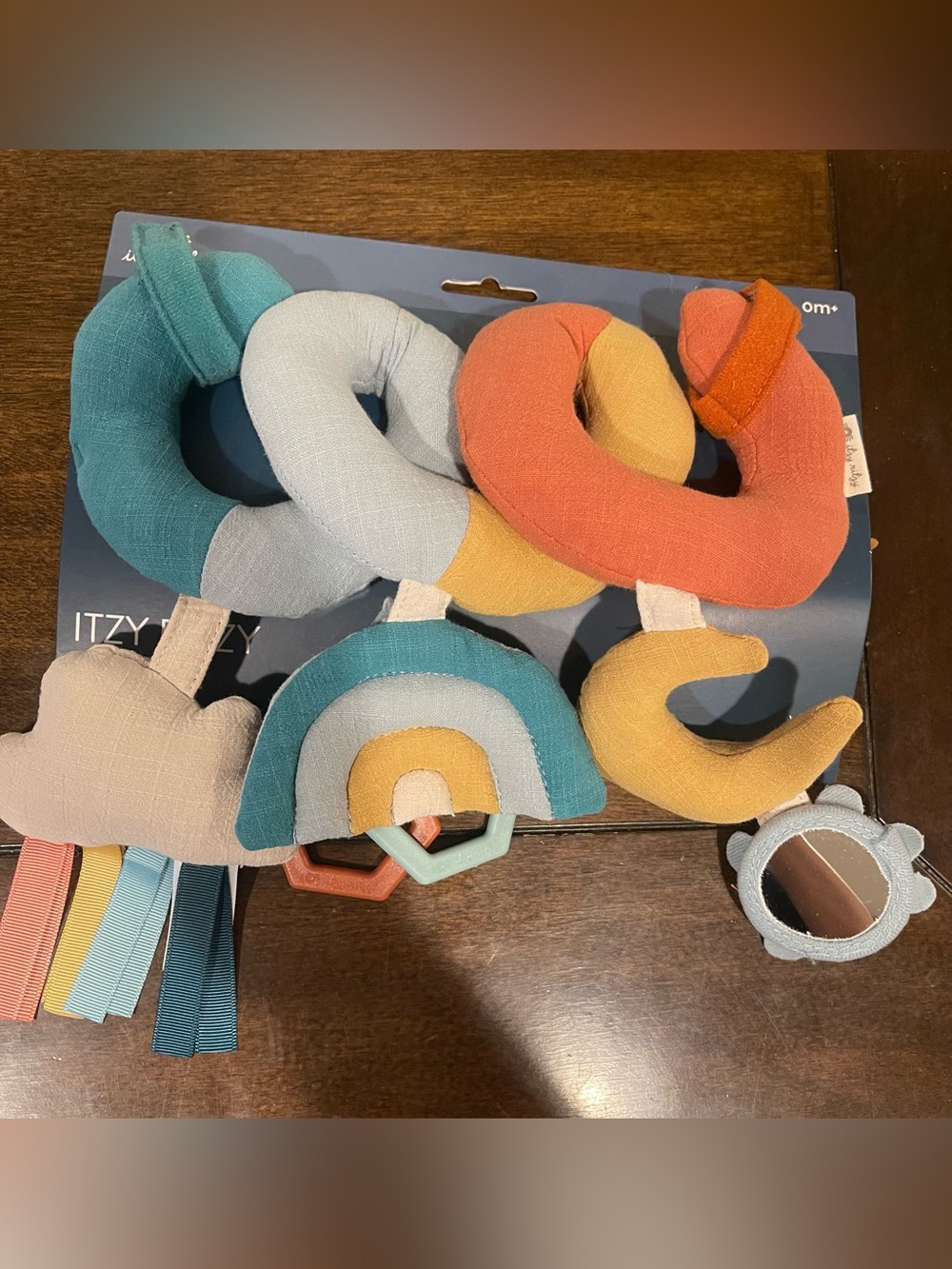 Itzy Ritzy Teal, Light Blue, Mustard & Rust Spiral Stroller Toy